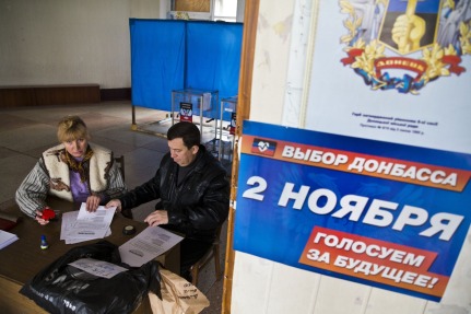 Election workers prepare ballots in the Donetsk Peoples' Republic